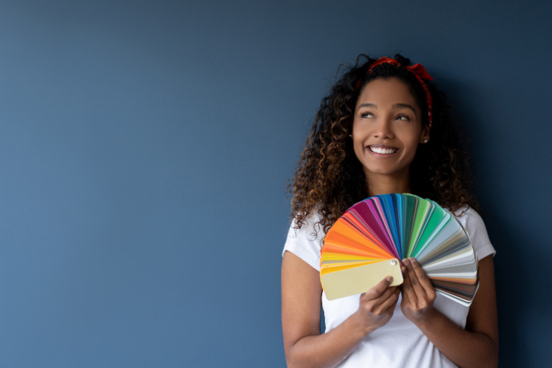 A woman picking colors